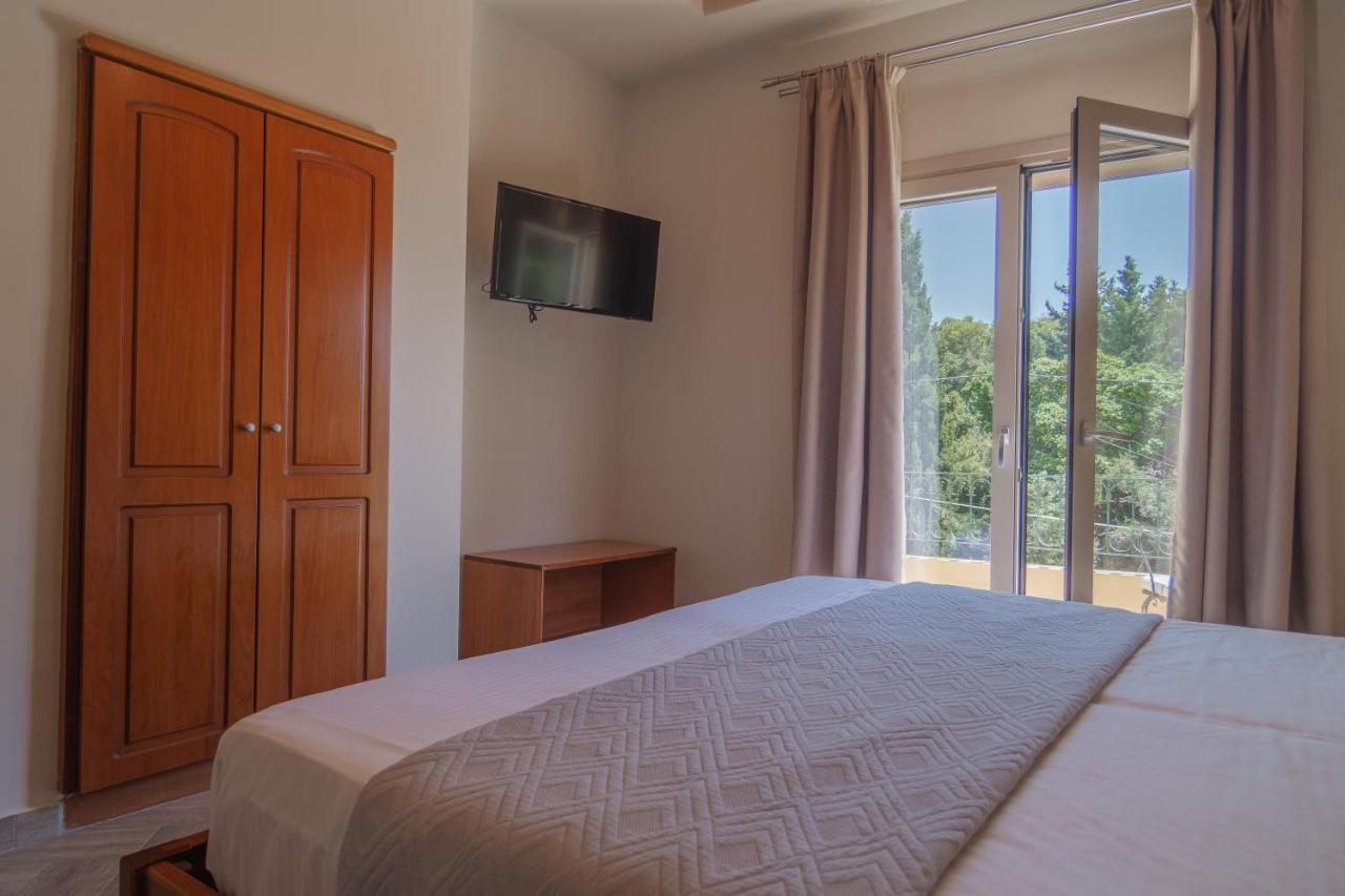 Aris Apartments Палеокастрица Экстерьер фото